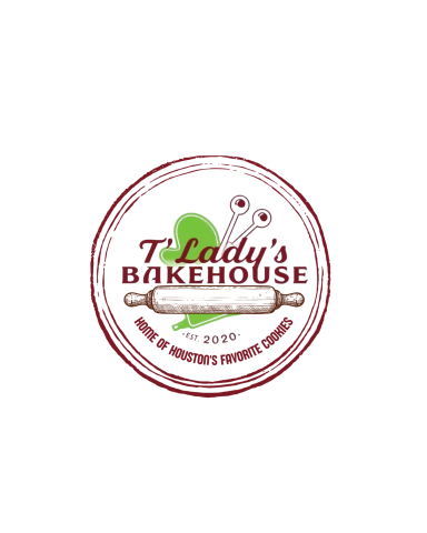 Logo for T'Lady's Bakehouse featuring a rolling pin and a heart design. Established 2020.